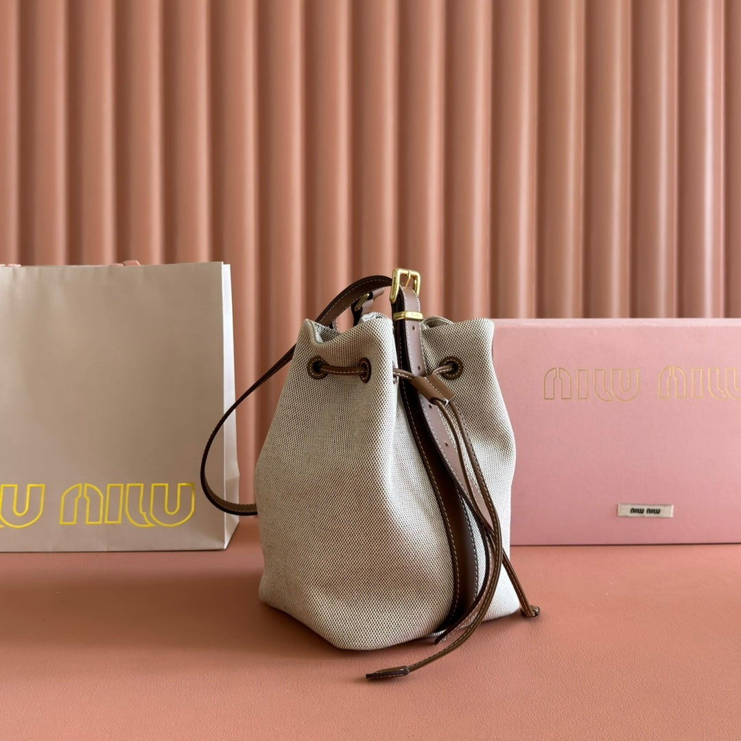 MIU MIU BUCKET BAG 22 BEIGE AND BRANDY IN CANVAS