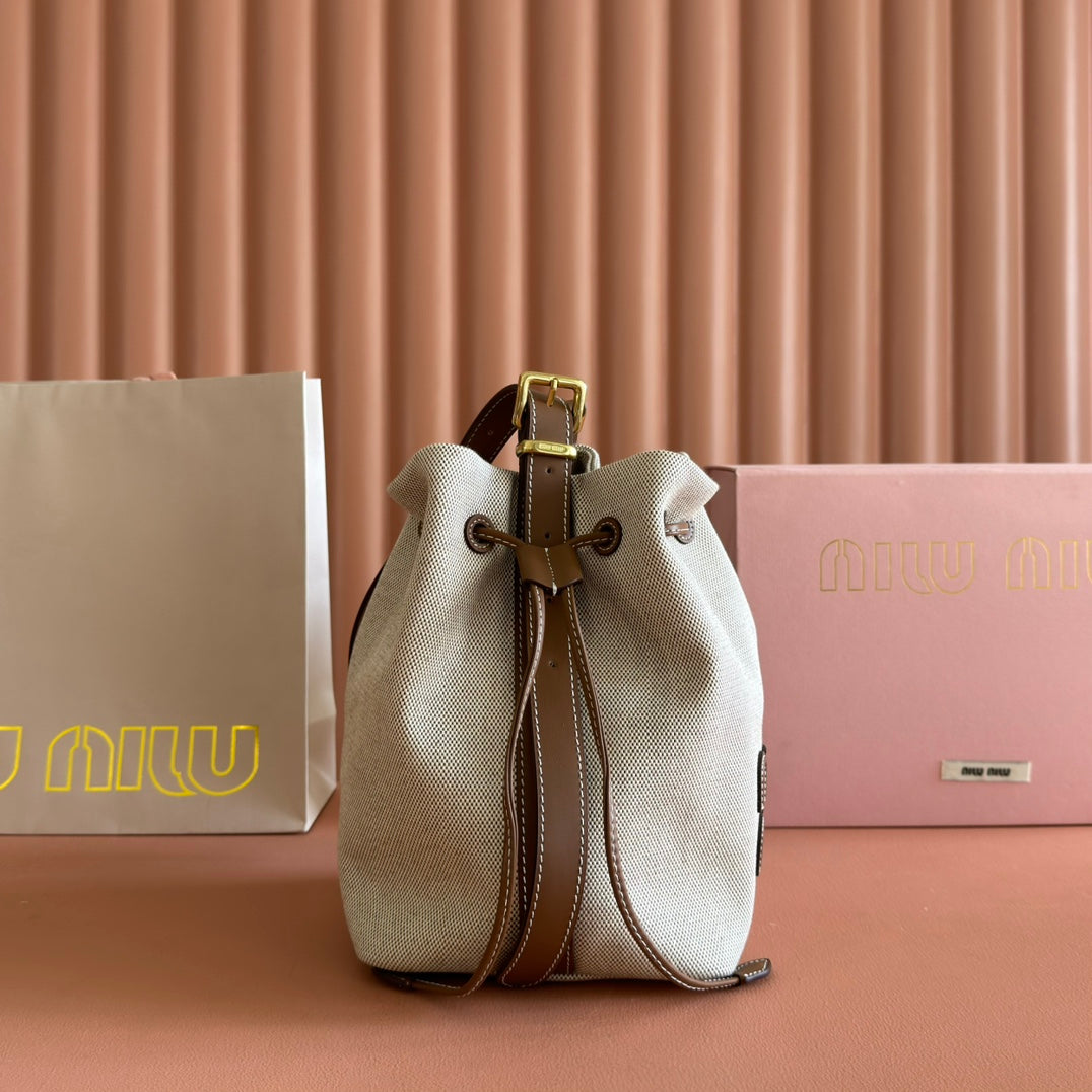 MIU MIU BUCKET BAG 22 BEIGE AND BRANDY IN CANVAS