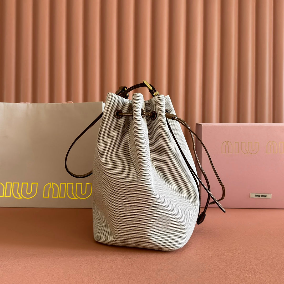 MIU MIU BUCKET BAG 29 BEIGE AND BRANDY IN CANVAS