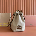 MIU MIU BUCKET BAG 29 BEIGE AND BRANDY IN CANVAS
