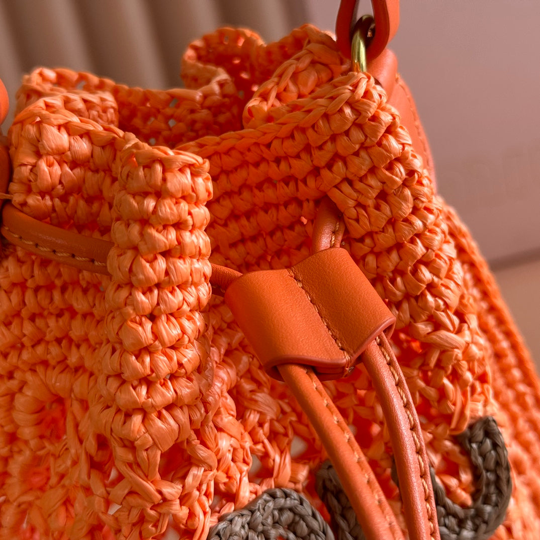 MIU MIU MIUMIU 26S WANDER BUCKET BAG 23 IN ORANGE RAFFIA WITH LEATHER TRIM