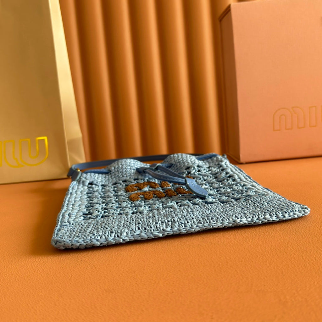 MIU MIU MIUMIU 26S WANDER BUCKET BAG 23 IN BLUE RAFFIA WITH LEATHER TRIM