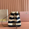 MIU MIU MIUMIU 26S BUCKET BAG 23 IN CREAM AND NAVY BLUE CANVAS GOLD HARDWARE