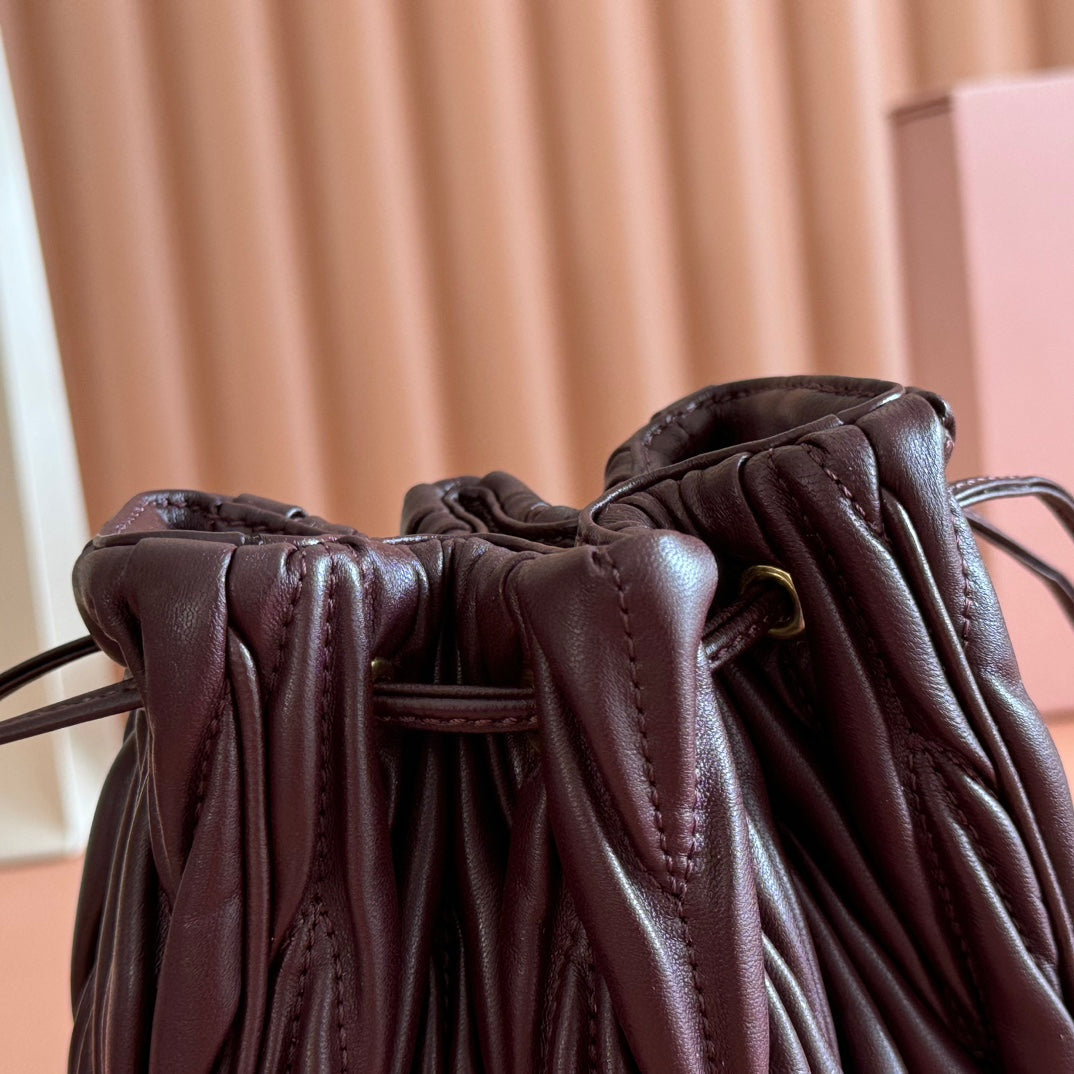 MIU MIU MIUMIU 26S MATELASSE POUCH BAG 16 IN DARK BROWN CALFSKIN GOLD HARDWARE