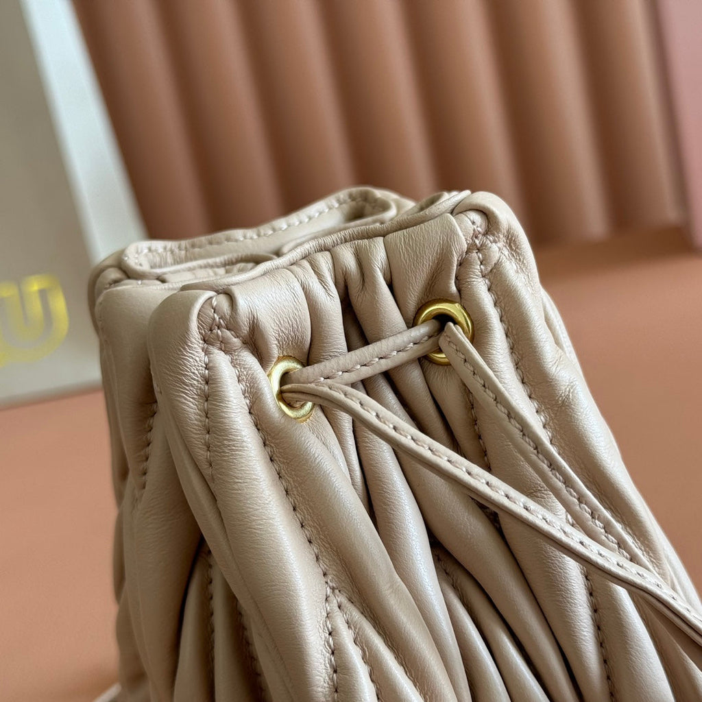 MIU MIU MIUMIU 26S MATELASSE POUCH BAG 16 IN LIGHT BEIGE CALFSKIN GOLD HARDWARE