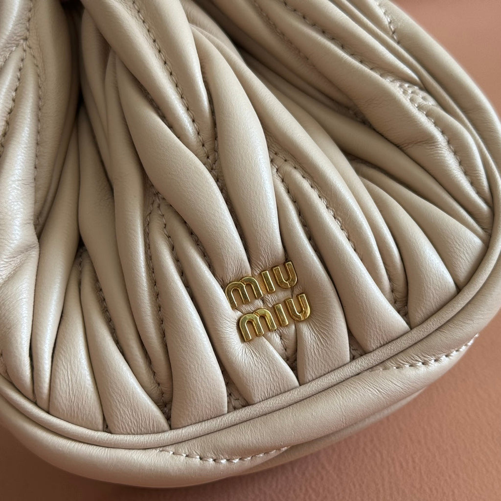 MIU MIU MIUMIU 26S MATELASSE POUCH BAG 16 IN LIGHT BEIGE CALFSKIN GOLD HARDWARE