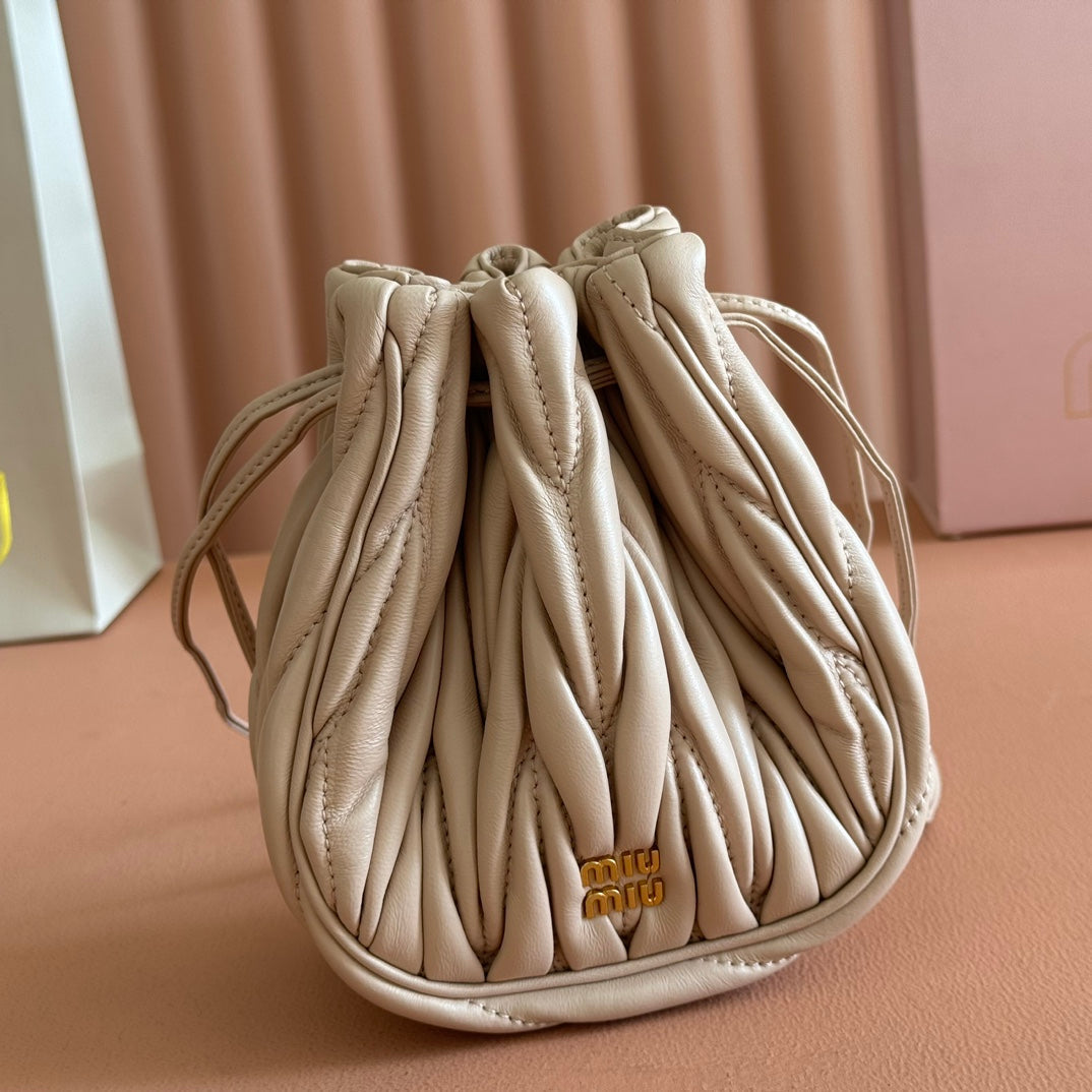 MIU MIU MIUMIU 26S MATELASSE POUCH BAG 16 IN LIGHT BEIGE CALFSKIN GOLD HARDWARE