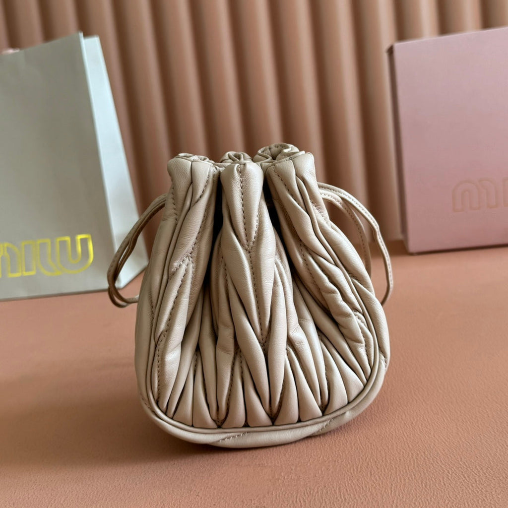MIU MIU MIUMIU 26S MATELASSE POUCH BAG 16 IN LIGHT BEIGE CALFSKIN GOLD HARDWARE