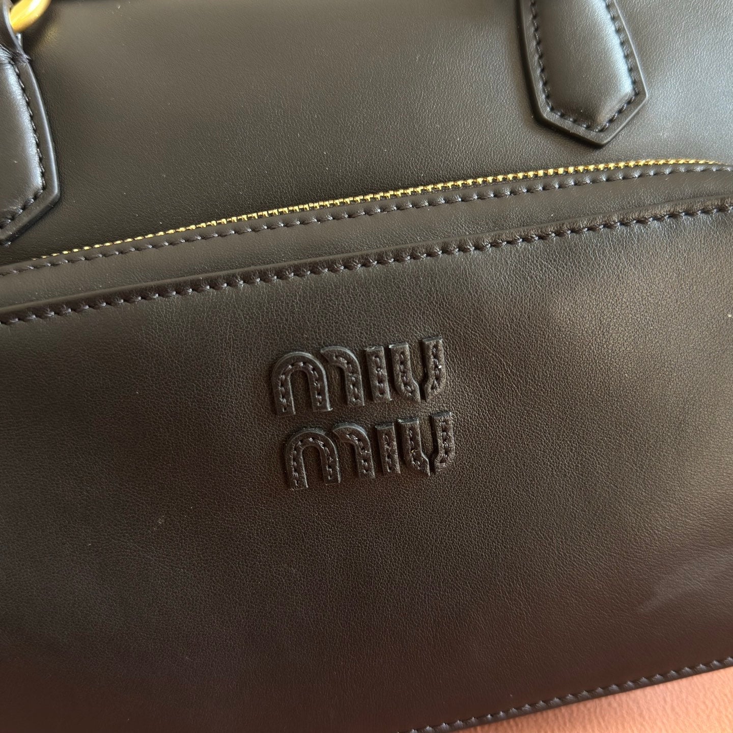 MIU MIU MIUMIU 26S POCKET TOP-HANDLE BAG 32 IN BLACK CALFSKIN GOLD HARDWARE