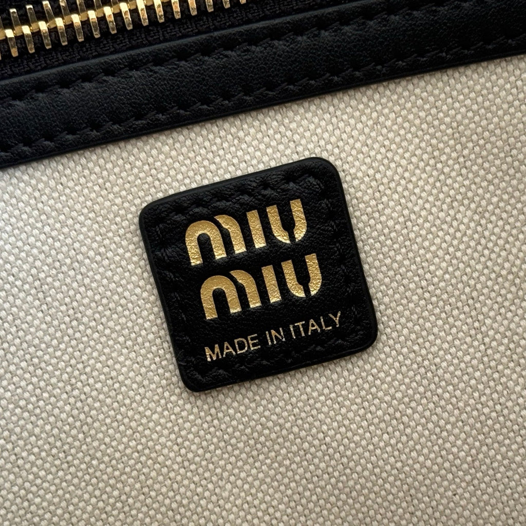 MIU MIU MIUMIU 26S POCKET TOP-HANDLE BAG 32 IN BLACK CALFSKIN GOLD HARDWARE