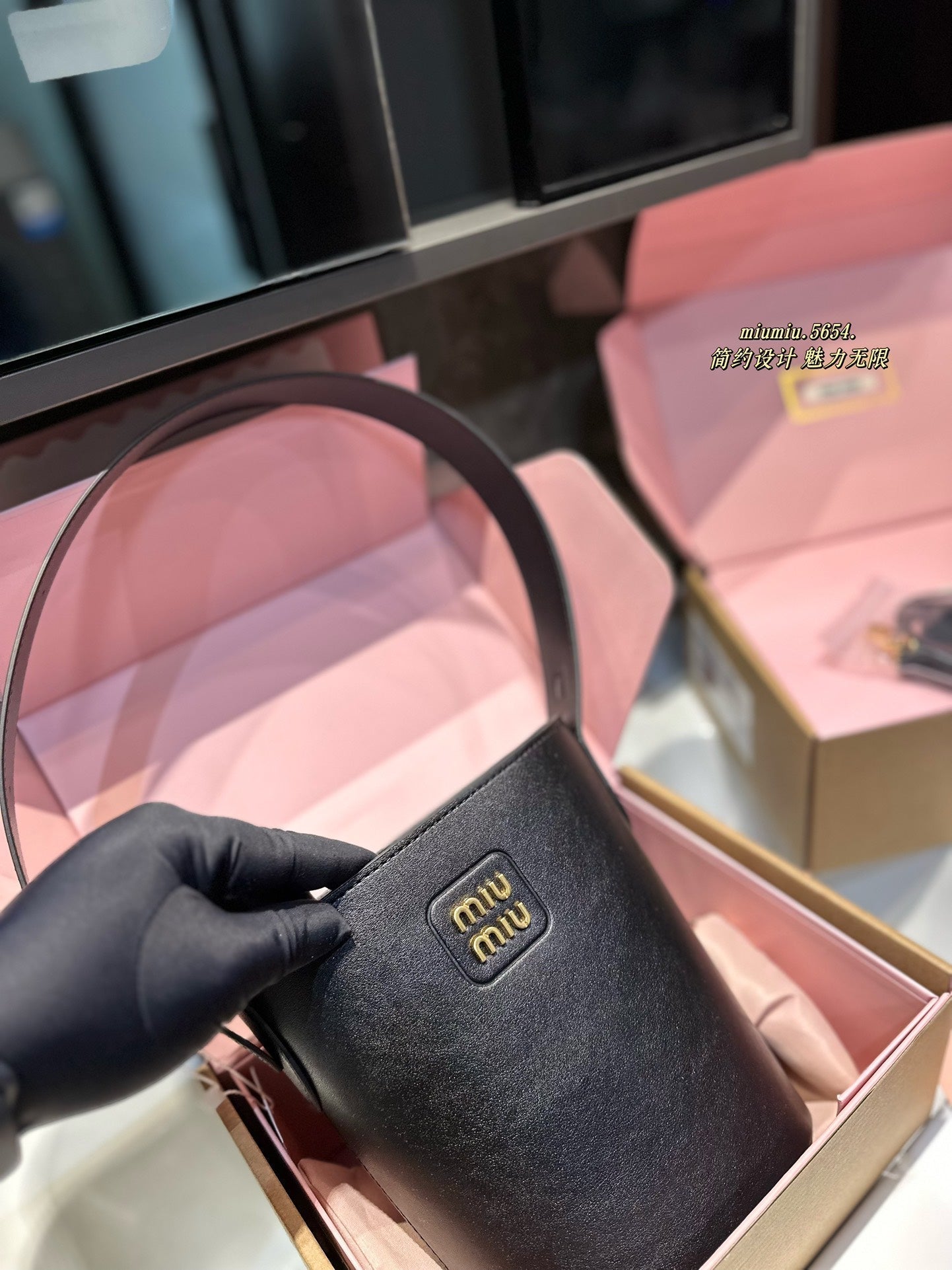 MIU MIU BUCKET 20 BAG IN BLACK CALFSKIN