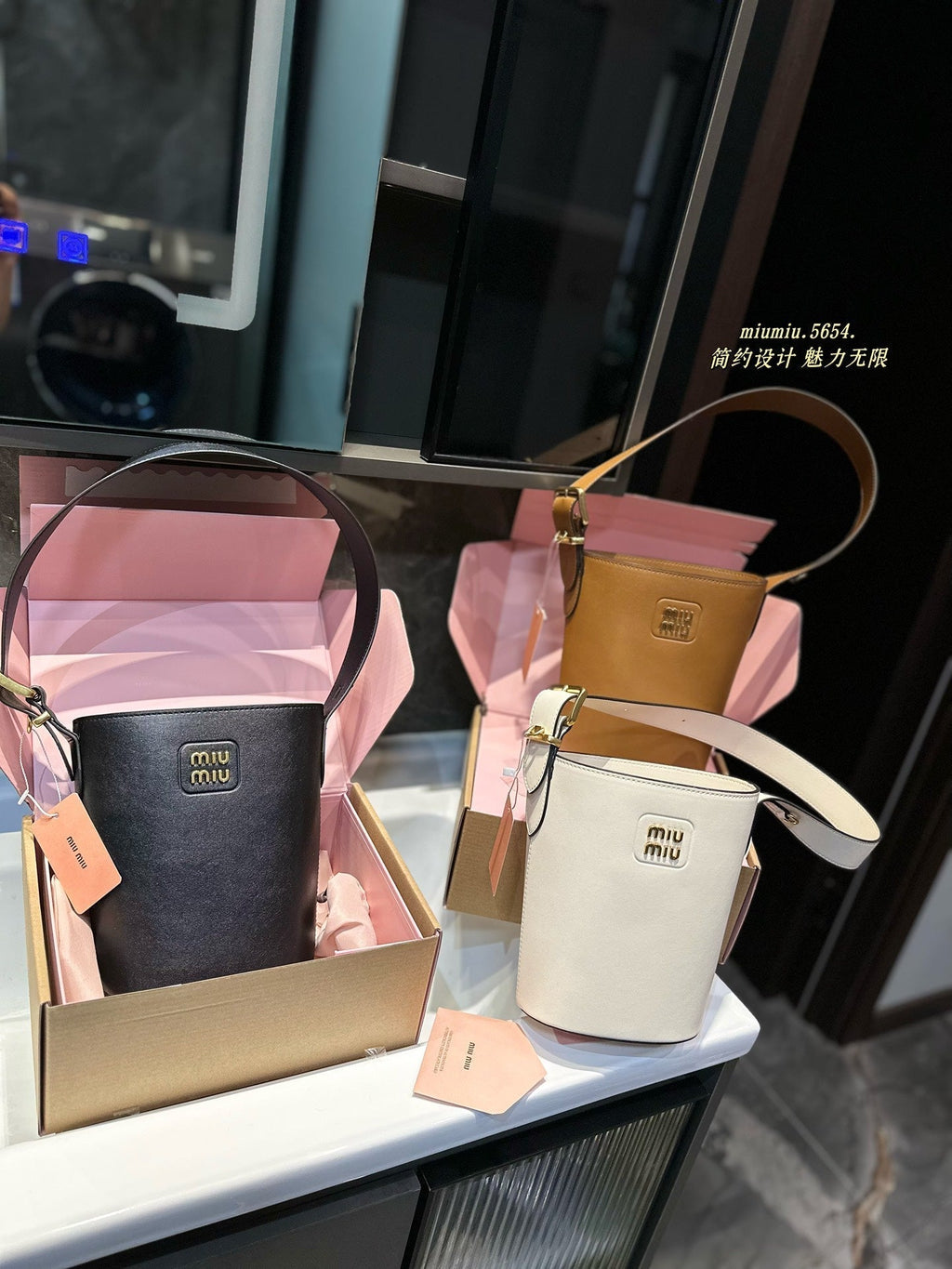 MIU MIU BUCKET 20 BAG IN BLACK CALFSKIN