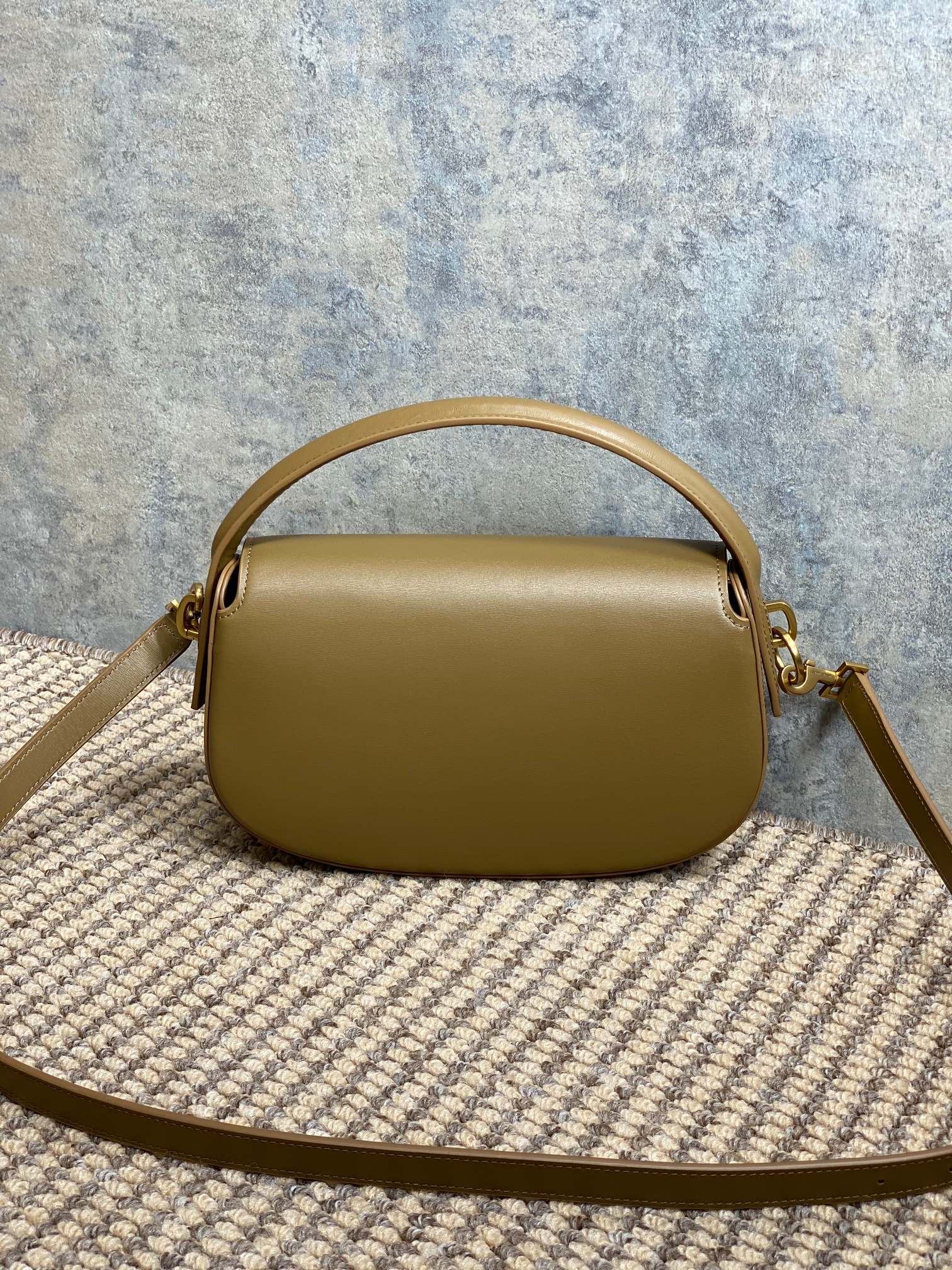 SAINT LAURENT VOLTAIRE HALF-MOON SHOULDER BAG 24 IN CEDAR BROWN CALFSKIN GOLD METALLIC