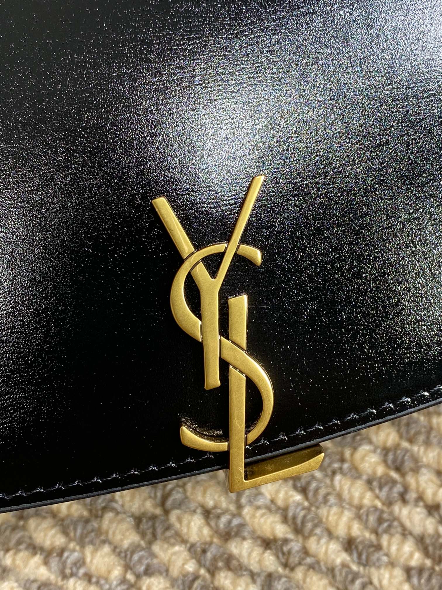 SAINT LAURENT VOLTAIRE HALF-MOON SHOULDER BAG 24 IN BLACK CALFSKIN GOLD METALLIC