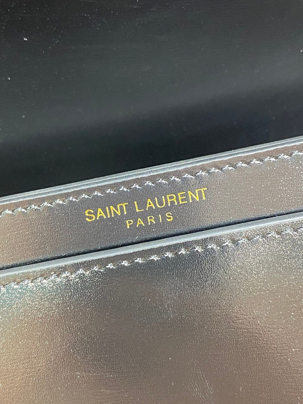 SAINT LAURENT VOLTAIRE HALF-MOON SHOULDER BAG 24 IN BLACK CALFSKIN GOLD METALLIC
