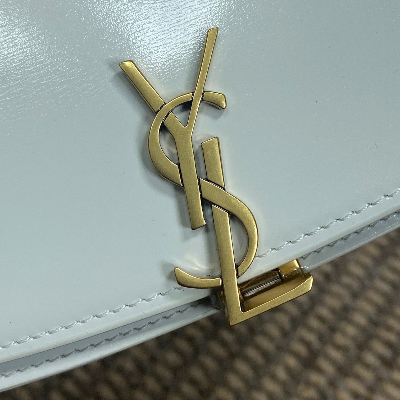 SAINT LAURENT VOLTAIRE HALF-MOON SHOULDER BAG 24 IN WHITE CALFSKIN GOLD METALLIC