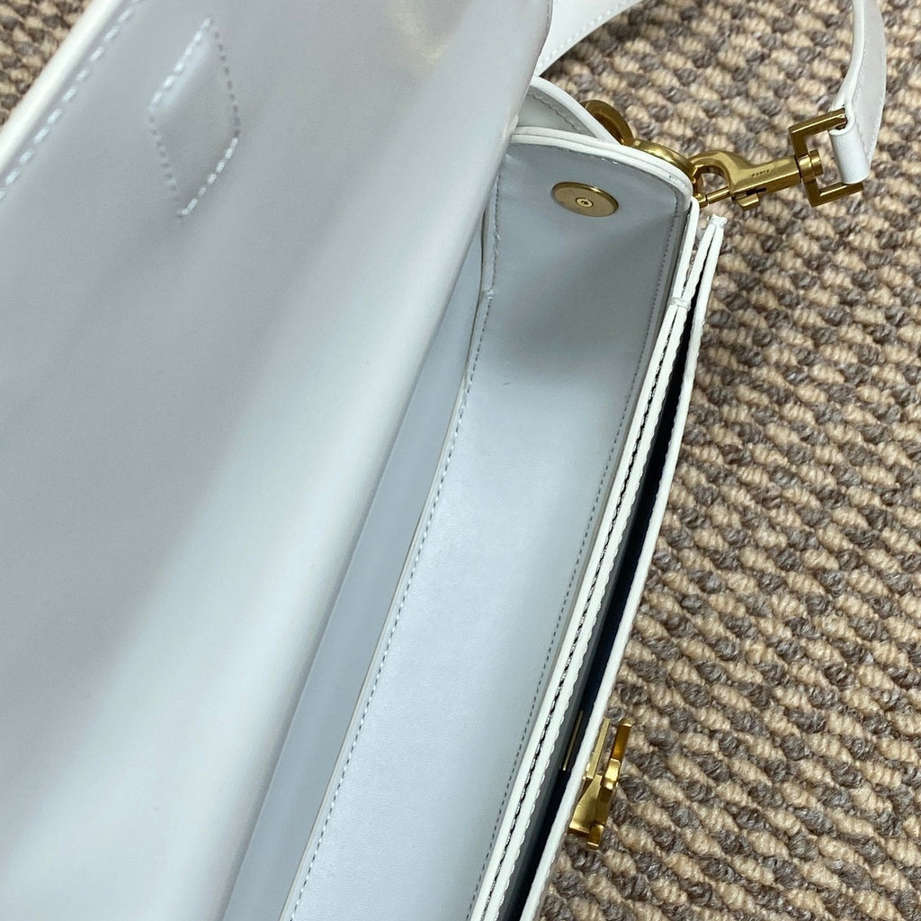 SAINT LAURENT VOLTAIRE HALF-MOON SHOULDER BAG 24 IN WHITE CALFSKIN GOLD METALLIC