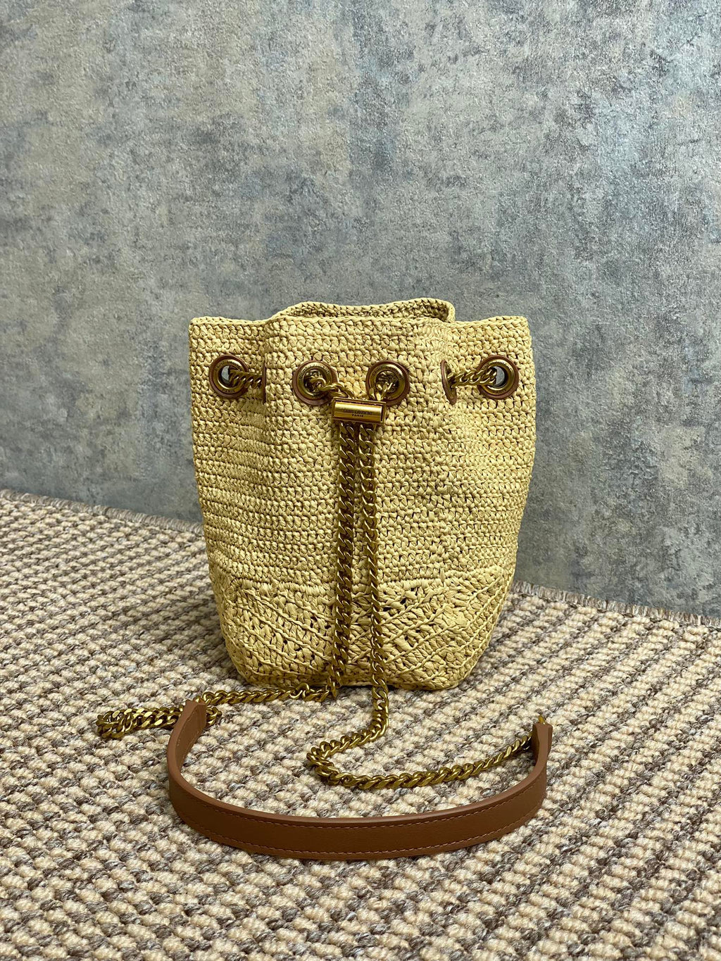 SAINT LAURENT DRAWSTRING BUCKET BAG 19 IN BEIGE WOVEN RAFFIA AND CALFSKIN