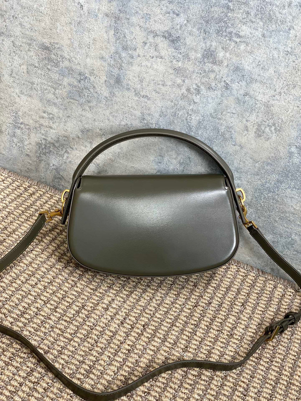 SAINT LAURENT VOLTAIRE HALF-MOON SHOULDER BAG 24 IN DARK GREEN CALFSKIN GOLD METALLIC