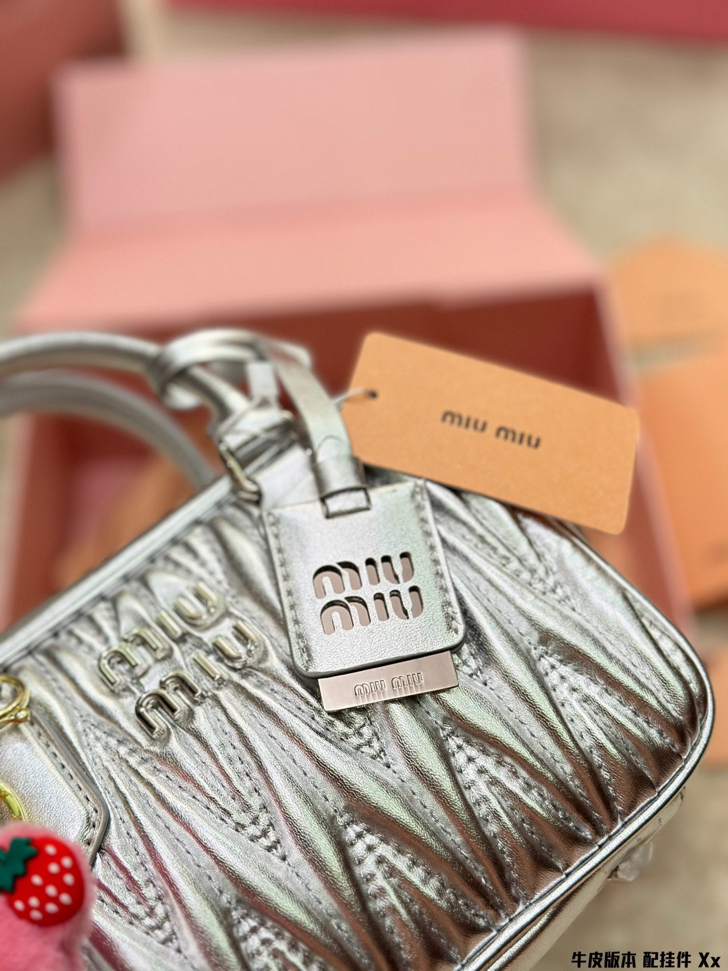 MIU MIU BOWLING BAG 21 IN SILVER LAMBSKIN
