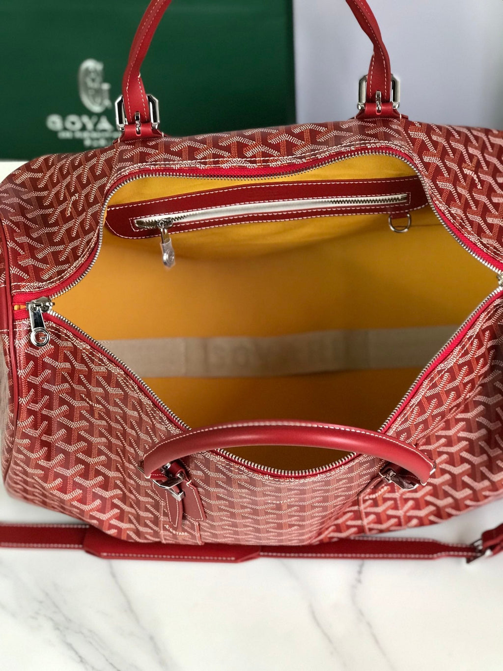 GOYARD BOSTON 50 BAG IN RED GOYARDINE CANVAS AND CALFSKIN TRIM