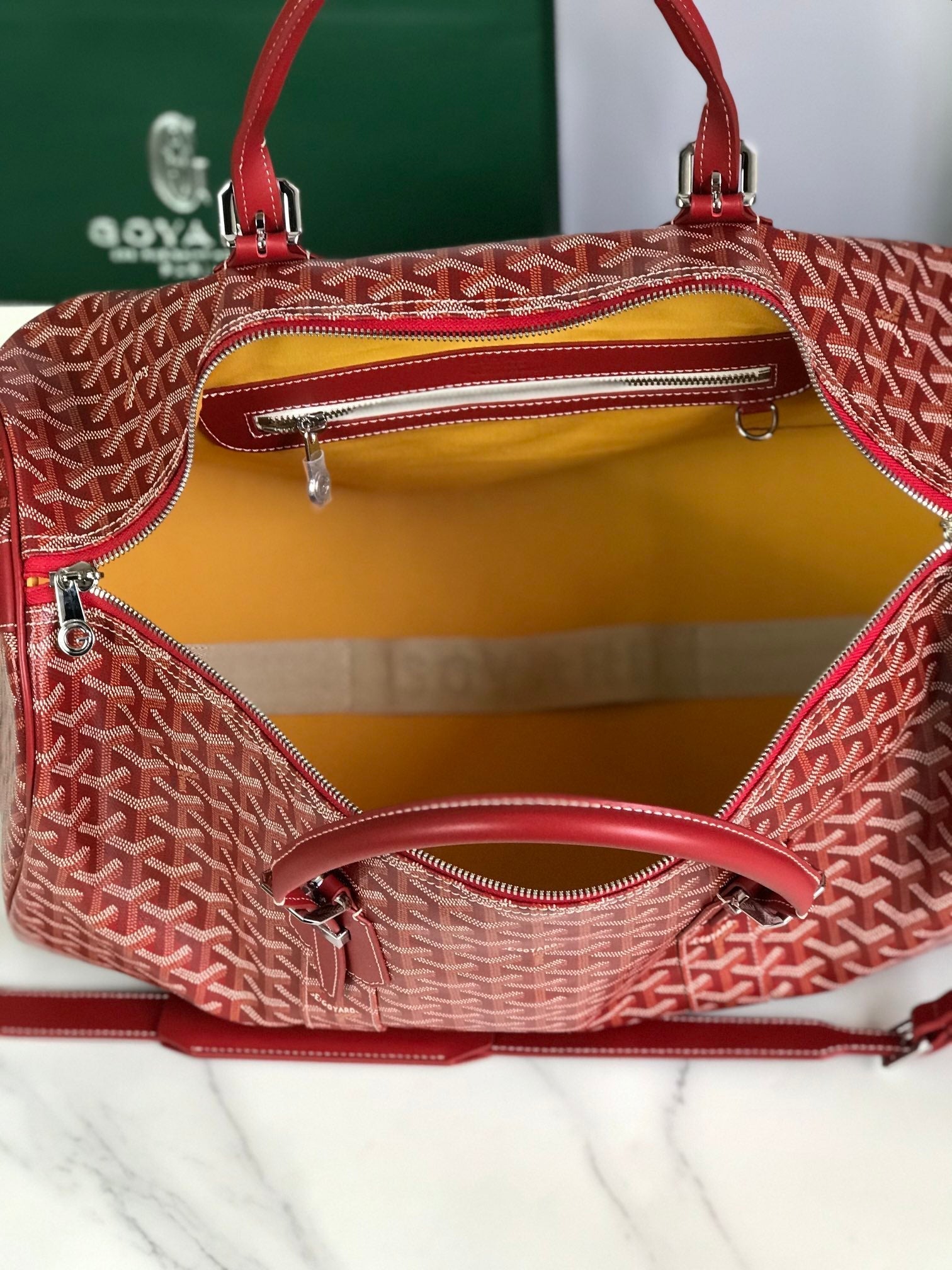 GOYARD BOSTON 50 BAG IN RED GOYARDINE CANVAS AND CALFSKIN TRIM