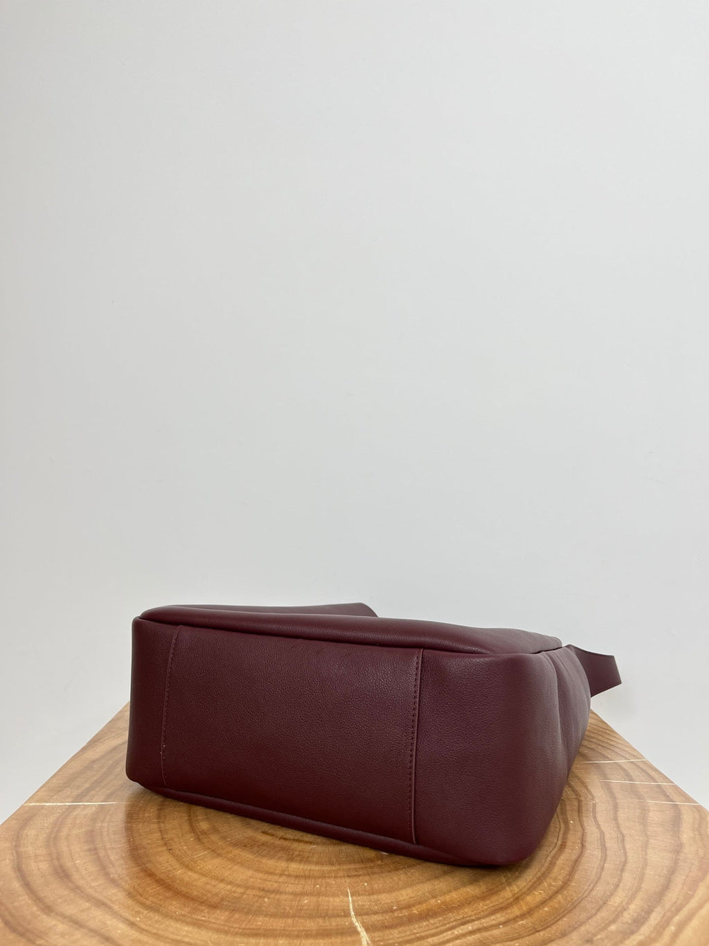 SAINT LAURENT LE 5 À 7 LARGE SUPPLE 31 IN WINE RED GRAINED CALFSKIN