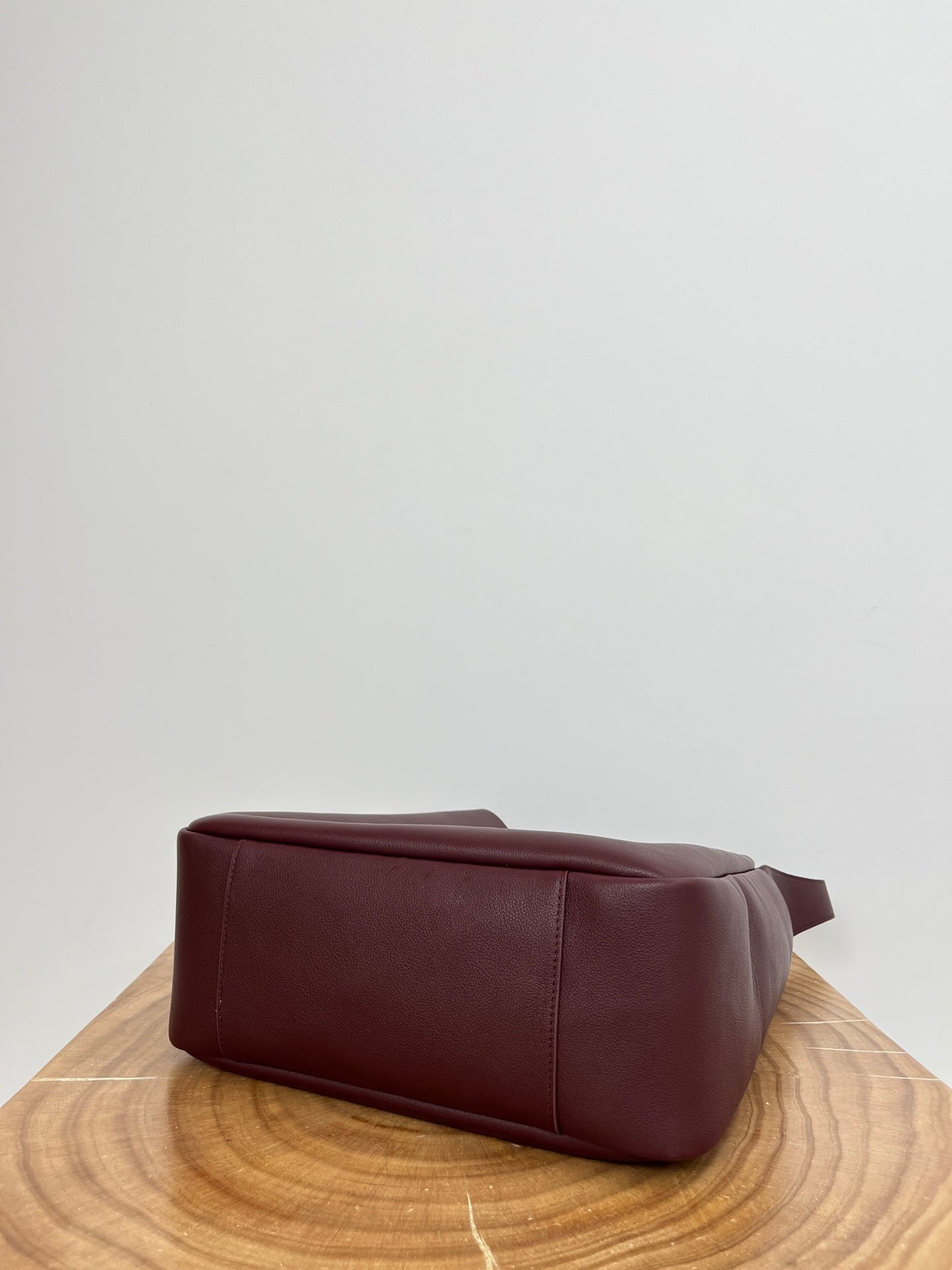 SAINT LAURENT LE 5 À 7 LARGE SUPPLE 31 IN WINE RED GRAINED CALFSKIN