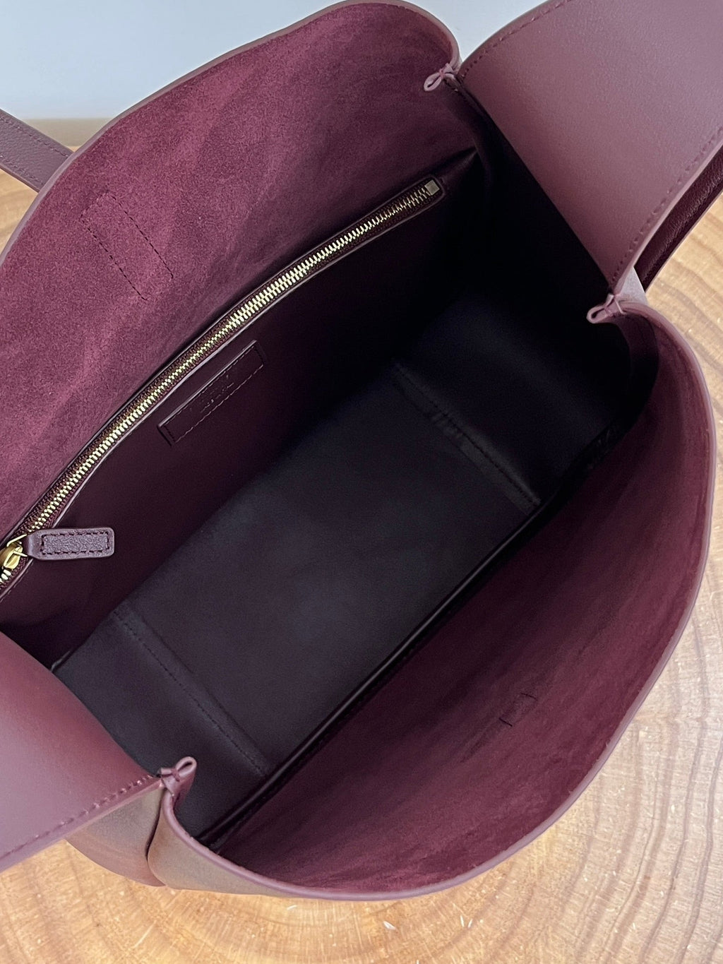 SAINT LAURENT LE 5 À 7 LARGE SUPPLE 31 IN WINE RED GRAINED CALFSKIN