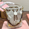 MIU MIU DRAWSTRING BUCKET BAG 21 IN WHITE CANVAS GOLD HARDWARE
