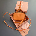MIU MIU MICRO BAG KEYCHAIN 11 IN HOT CINNAMON ORANGE CALFSKIN EMBOSSED LOGO