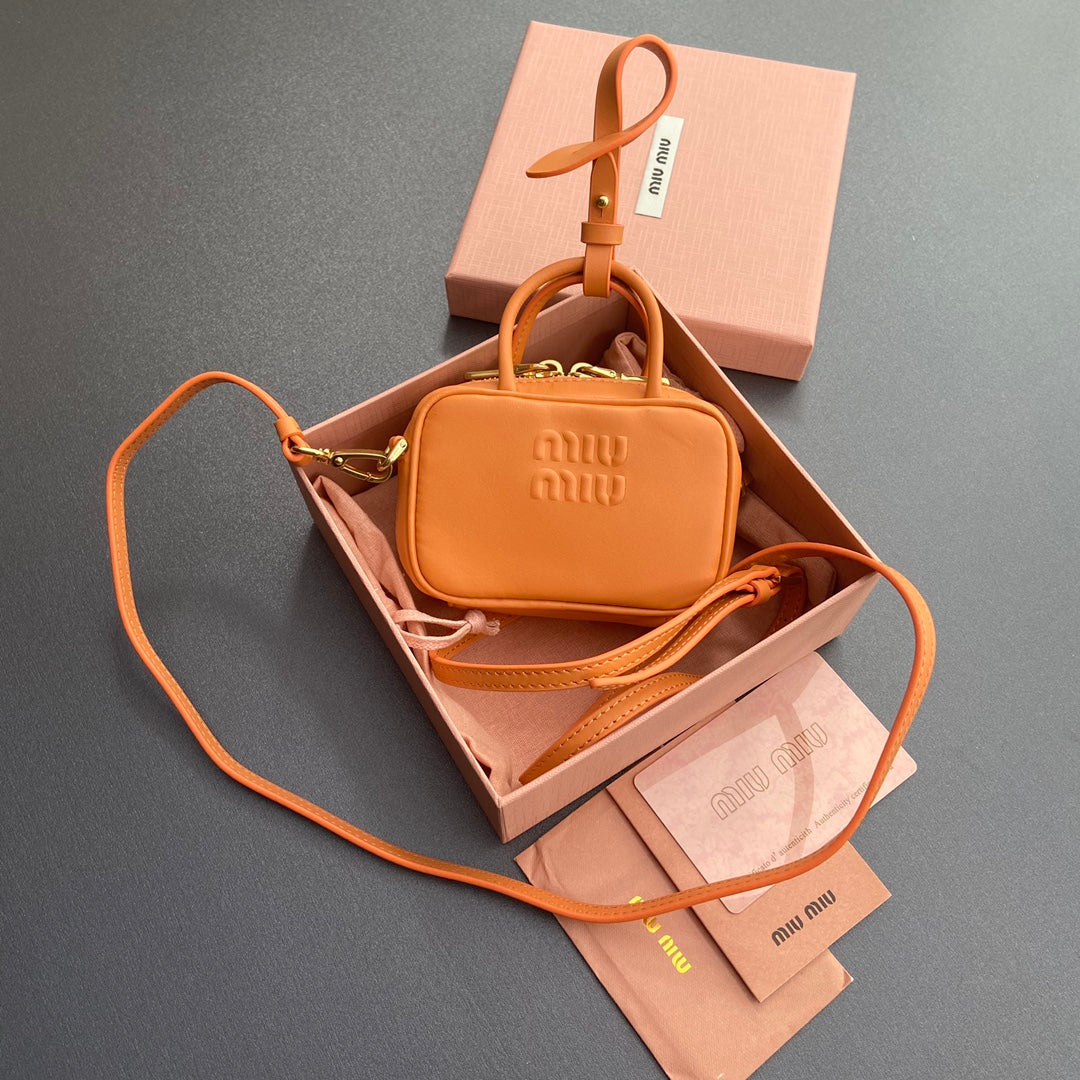 MIU MIU MICRO BAG KEYCHAIN 11 IN HOT CINNAMON ORANGE CALFSKIN EMBOSSED LOGO