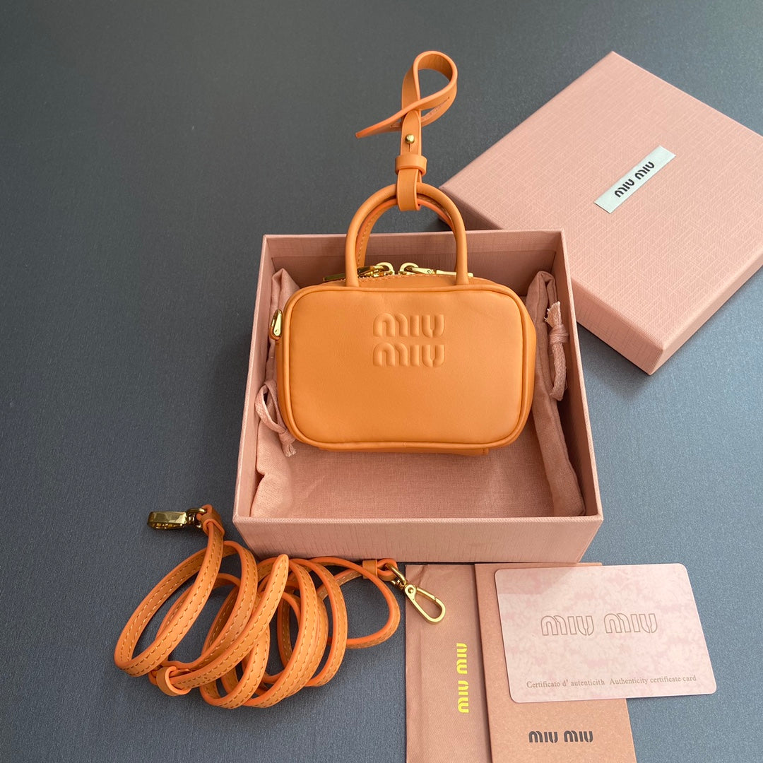 MIU MIU MICRO BAG KEYCHAIN 11 IN HOT CINNAMON ORANGE CALFSKIN EMBOSSED LOGO