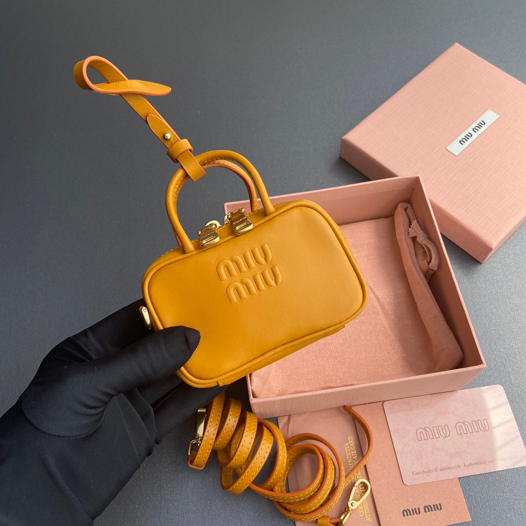 MIU MIU MICRO BAG KEYCHAIN 11 IN INDOCHINE ORANGE CALFSKIN EMBOSSED LOGO