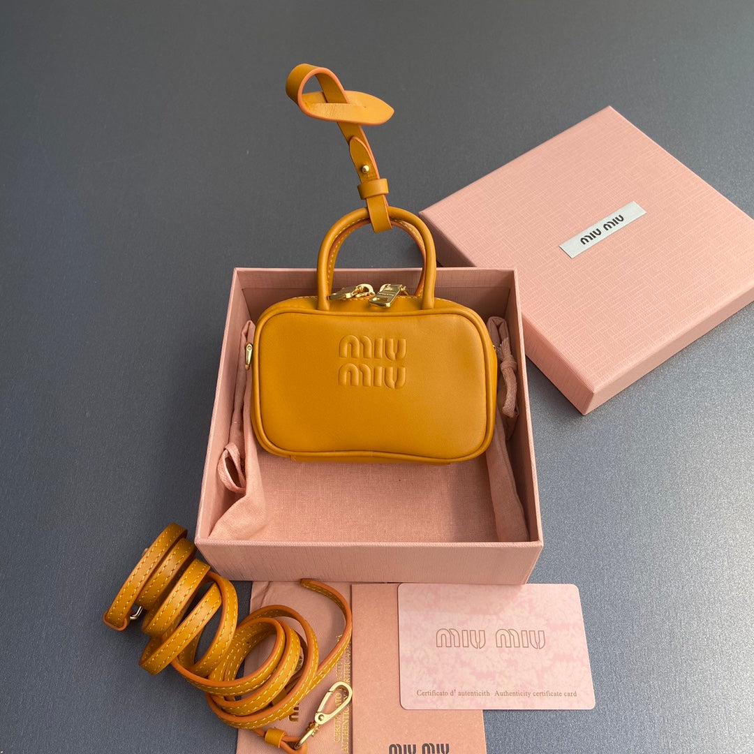 MIU MIU MICRO BAG KEYCHAIN 11 IN INDOCHINE ORANGE CALFSKIN EMBOSSED LOGO