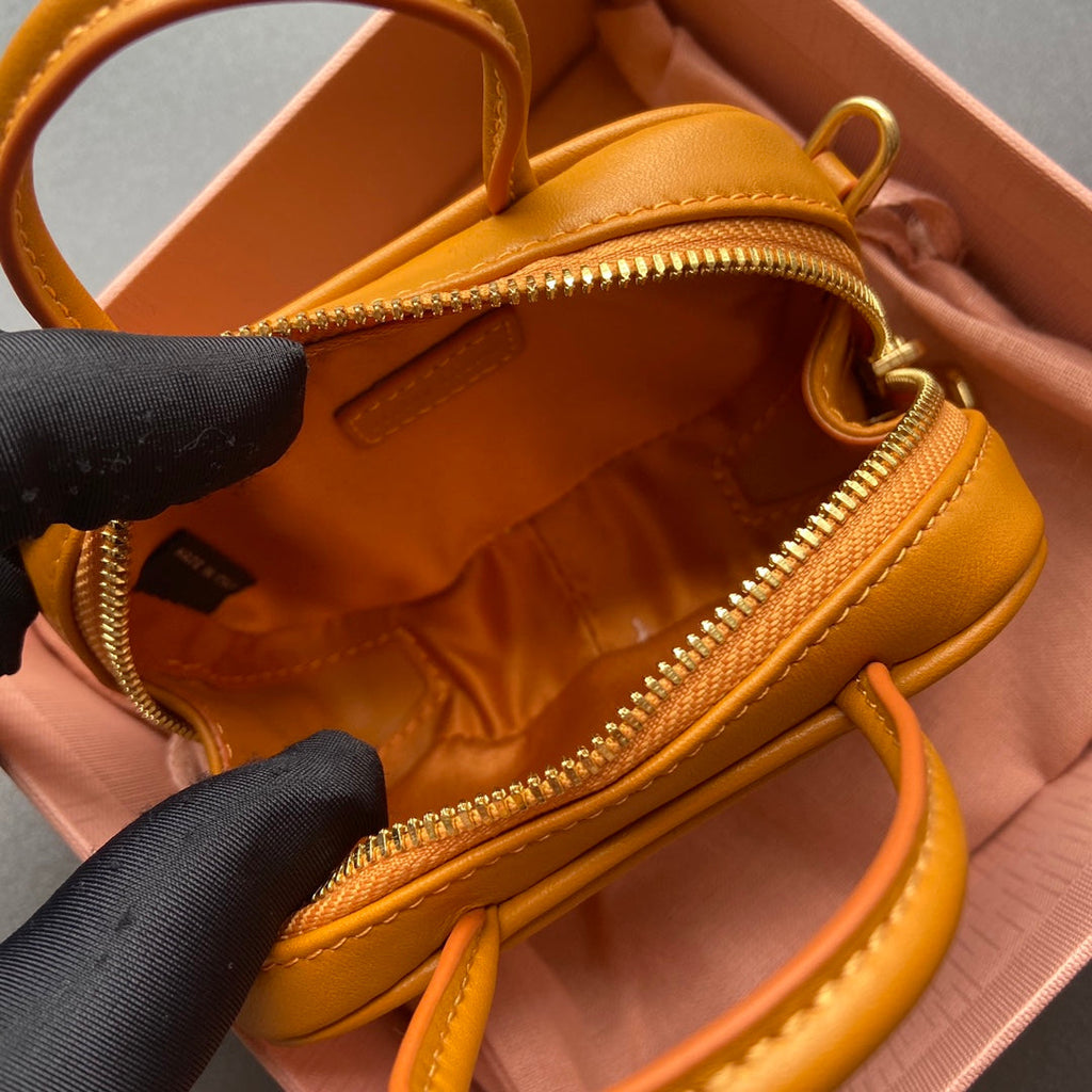 MIU MIU MICRO BAG KEYCHAIN 11 IN INDOCHINE ORANGE CALFSKIN EMBOSSED LOGO