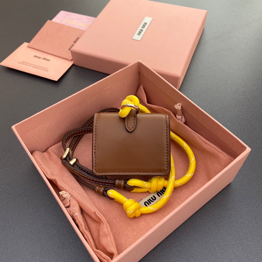 MIU MIU MICRO BAG 7 IN TAWNY BROWN SMOOTH LAMBSKIN YELLOW STRAP