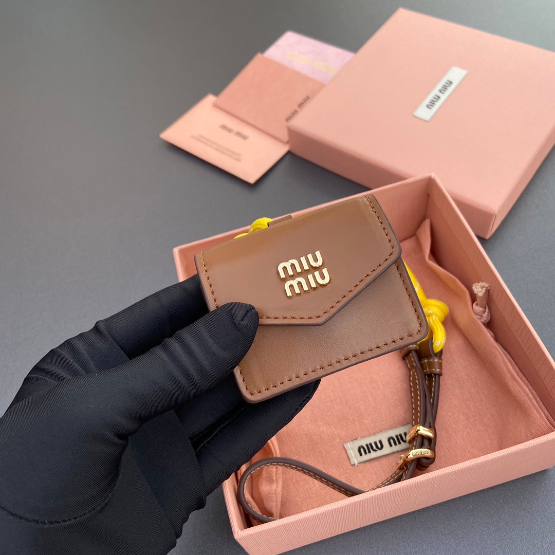 MIU MIU MICRO BAG 7 IN TAWNY BROWN SMOOTH LAMBSKIN YELLOW STRAP