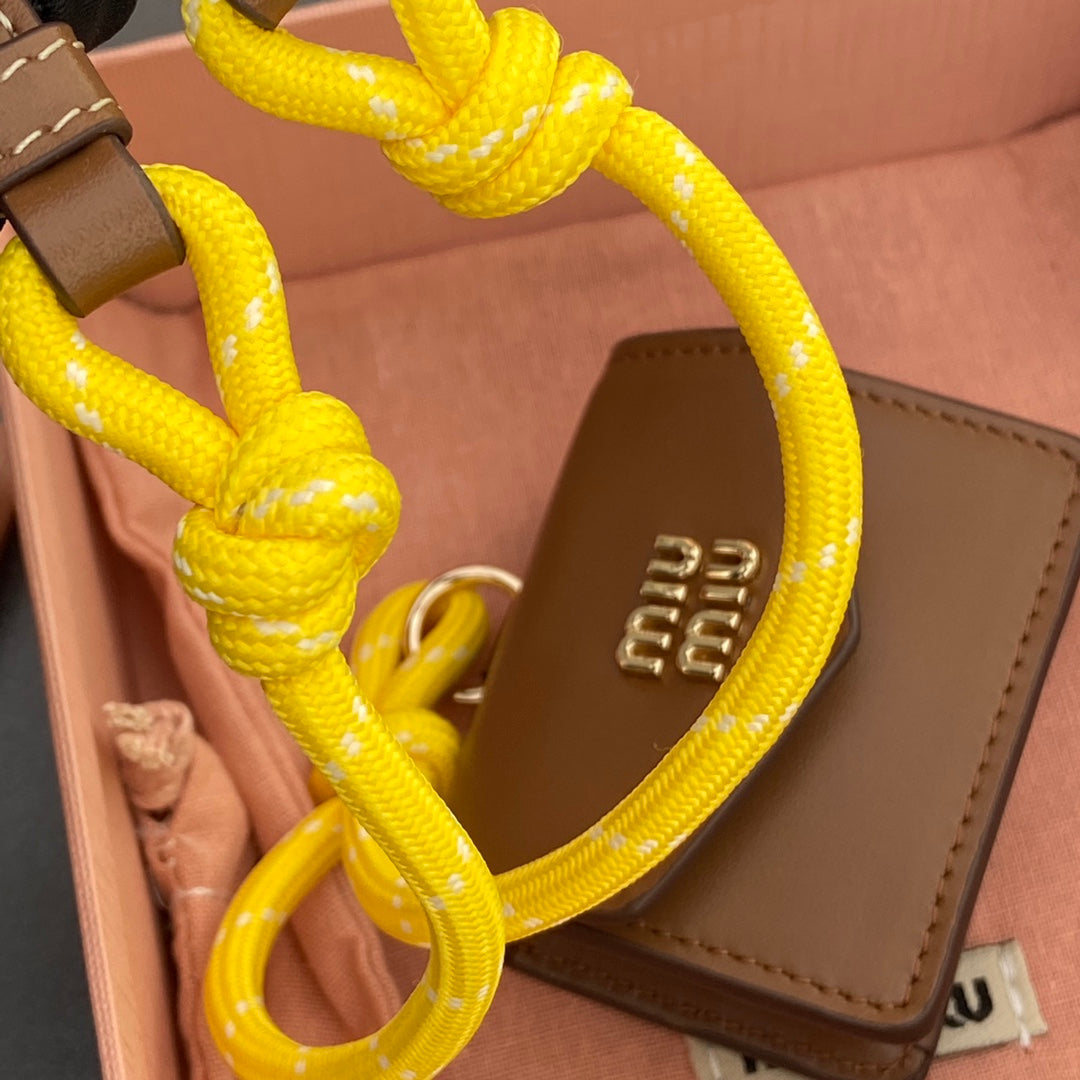 MIU MIU MICRO BAG 7 IN TAWNY BROWN SMOOTH LAMBSKIN YELLOW STRAP
