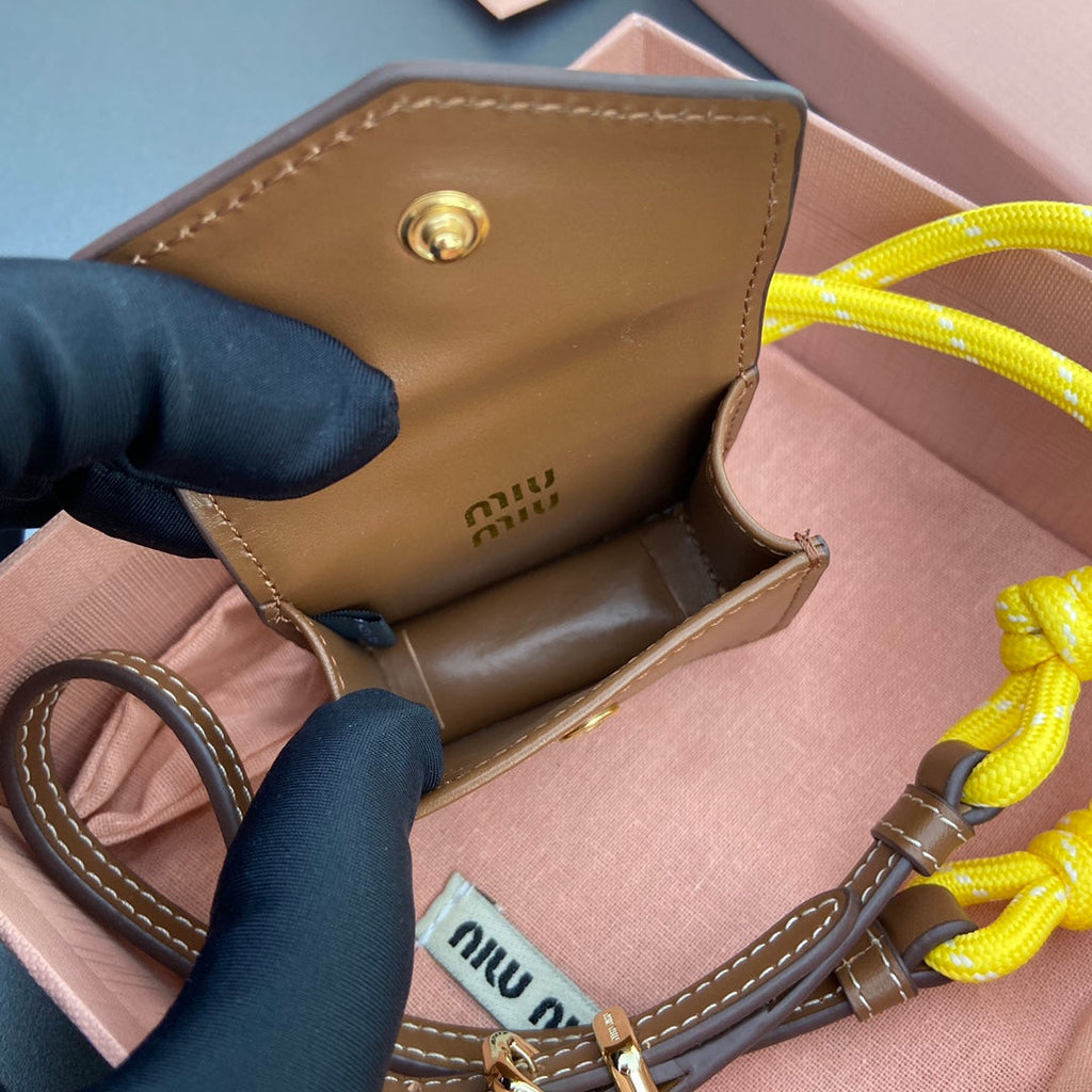 MIU MIU MICRO BAG 7 IN TAWNY BROWN SMOOTH LAMBSKIN YELLOW STRAP