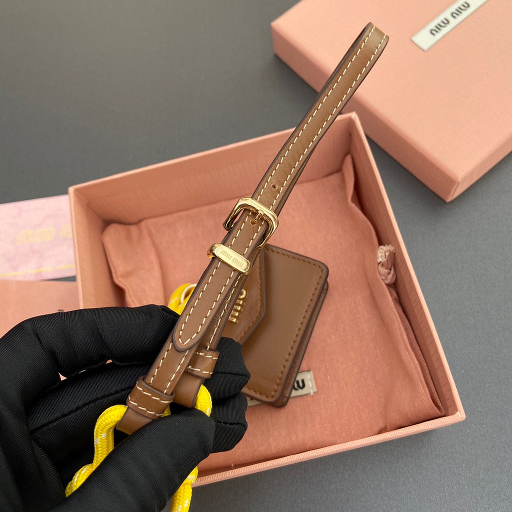 MIU MIU MICRO BAG 7 IN TAWNY BROWN SMOOTH LAMBSKIN YELLOW STRAP