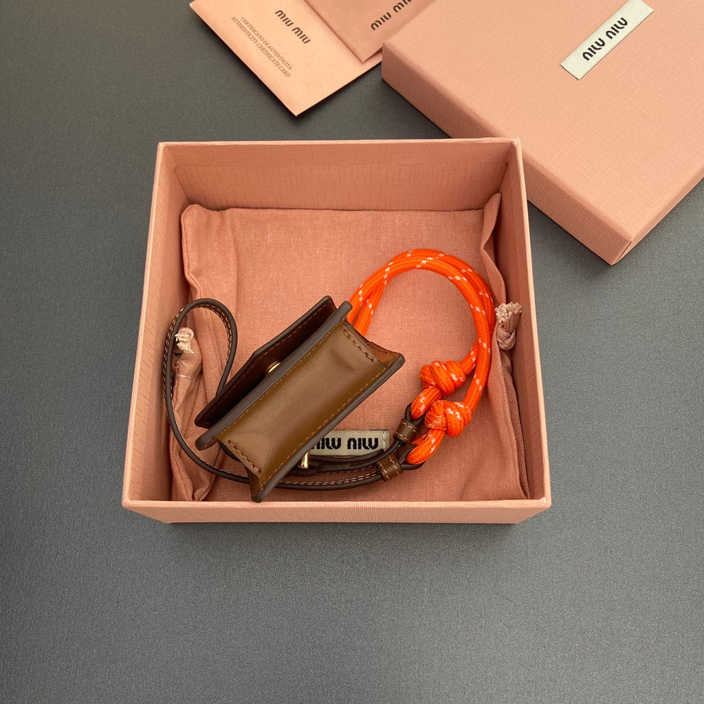 MIU MIU MICRO BAG 7 IN TAWNY BROWN SMOOTH LAMBSKIN ORANGE STRAP