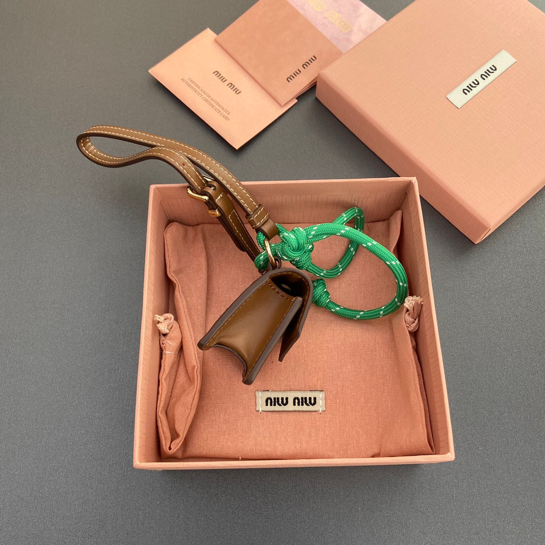 MIU MIU MICRO BAG 7 IN TAWNY BROWN SMOOTH LAMBSKIN GREEN STRAP