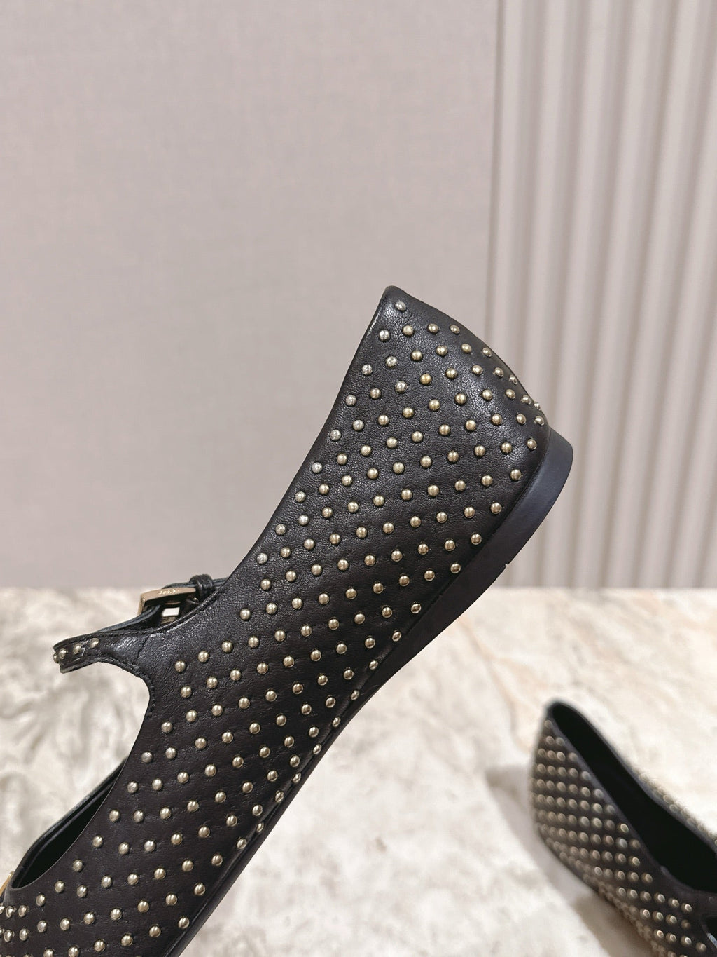 PRADA 25S STUD EMBELLISHED BALLERINA IN BLACK CALFSKIN