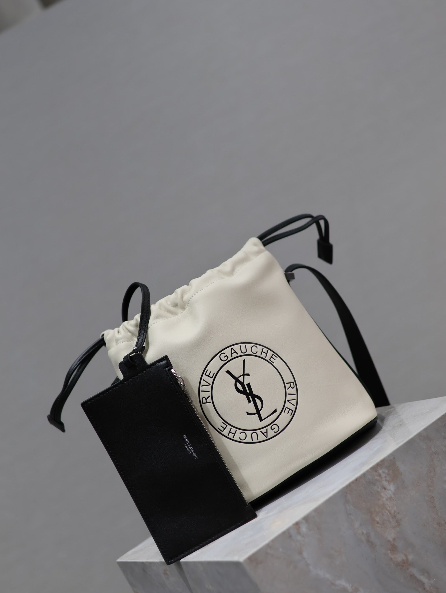 SAINT LAURENT RIVE GAUCHE BUCKET BAG 23 IN WHITE CALFSKIN