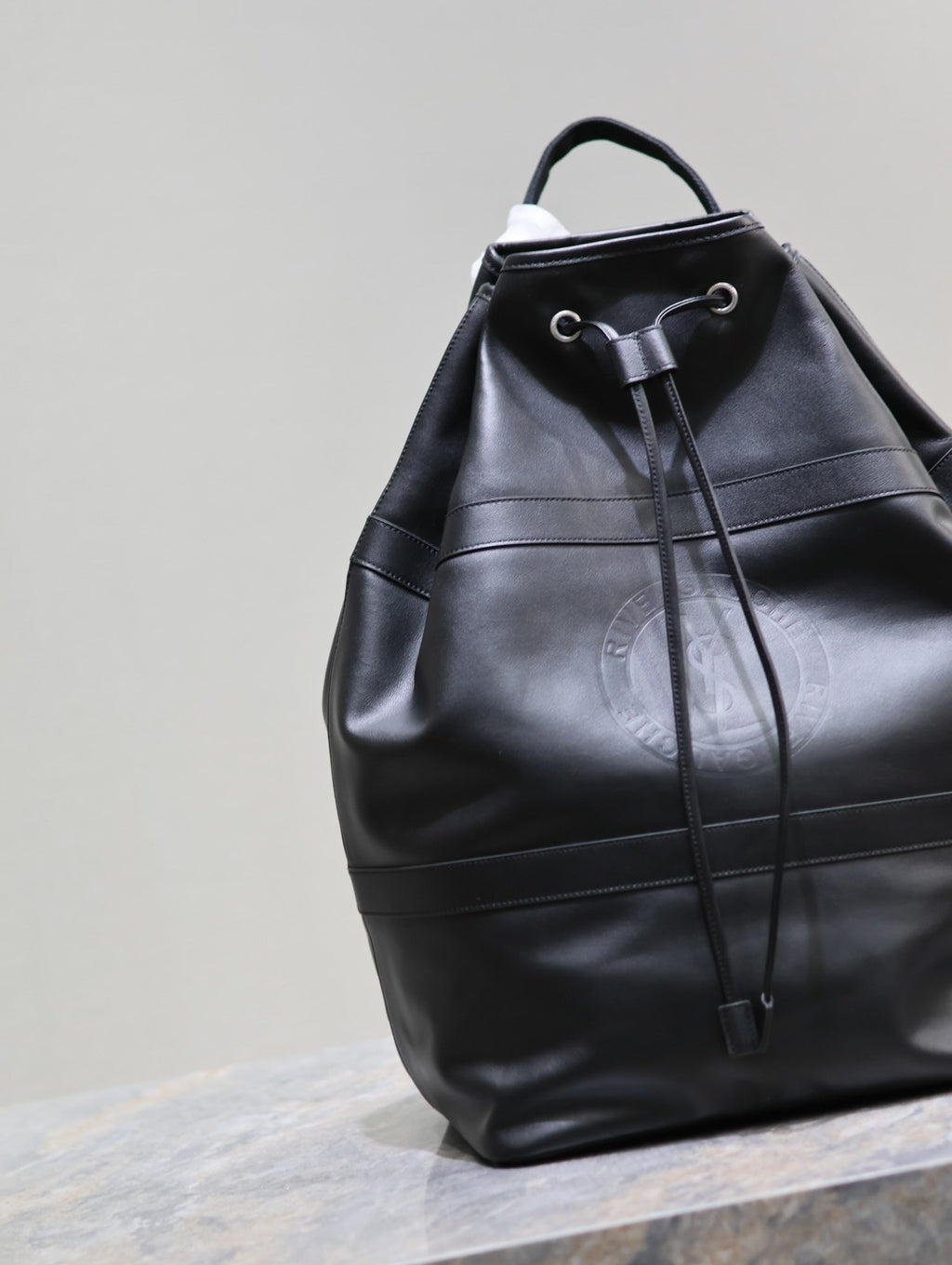 SAINT LAURENT RIVE GAUCHE BACKPACK 49 IN BLACK CALFSKIN