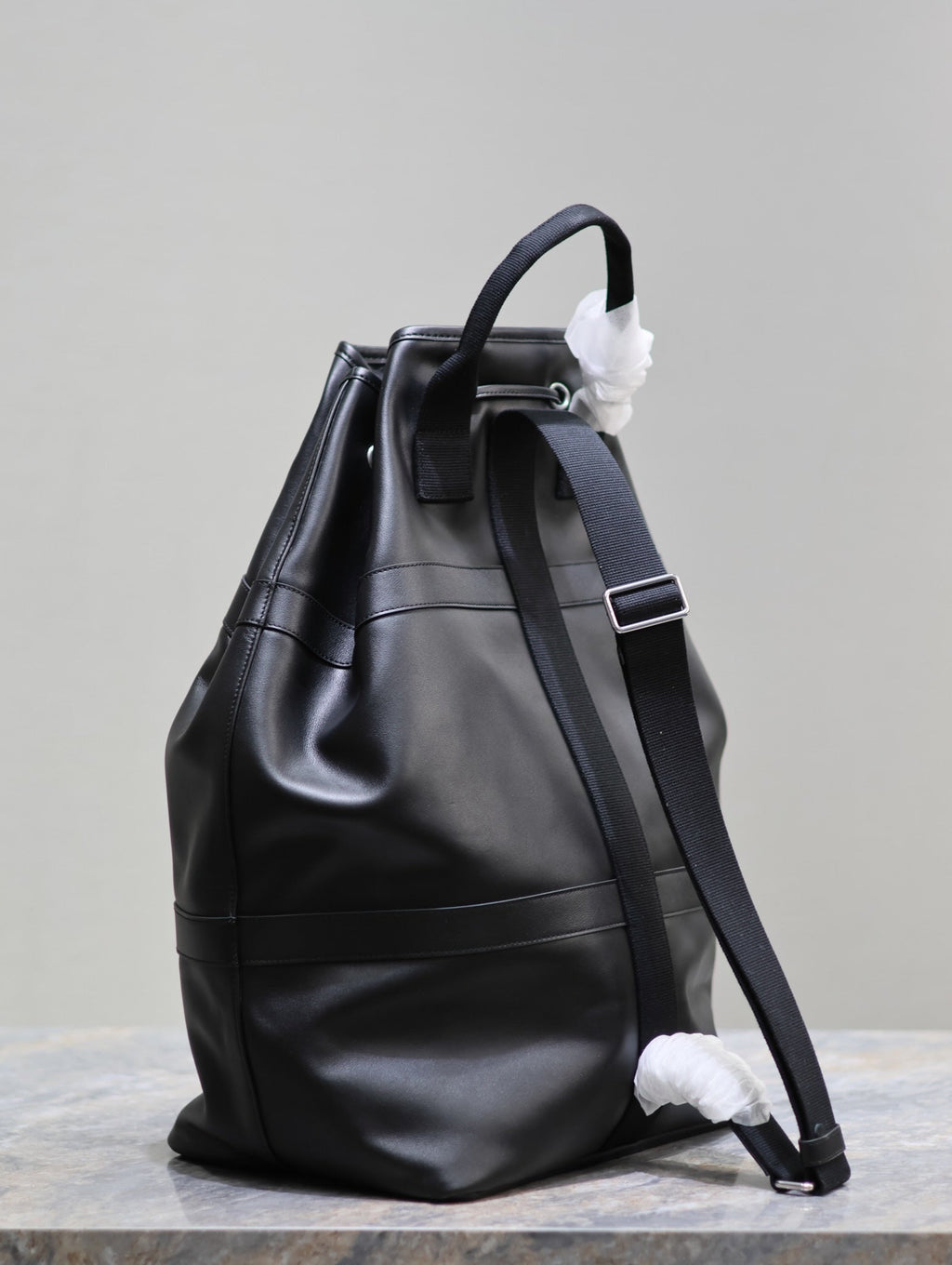 SAINT LAURENT RIVE GAUCHE BACKPACK 49 IN BLACK CALFSKIN