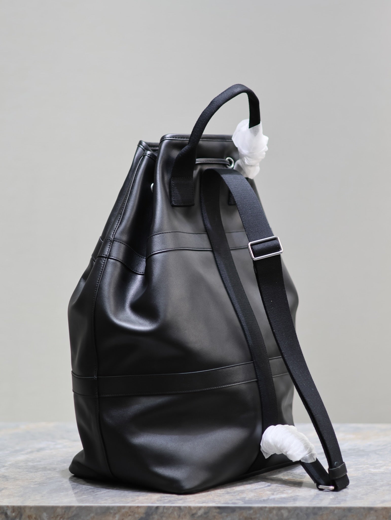 SAINT LAURENT RIVE GAUCHE BACKPACK 49 IN BLACK CALFSKIN