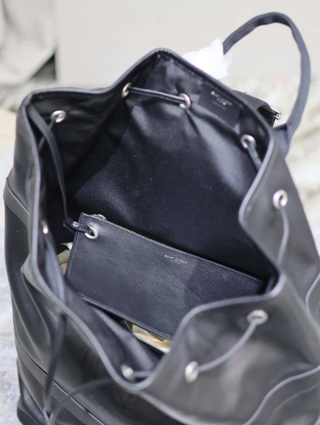 SAINT LAURENT RIVE GAUCHE BACKPACK 49 IN BLACK CALFSKIN
