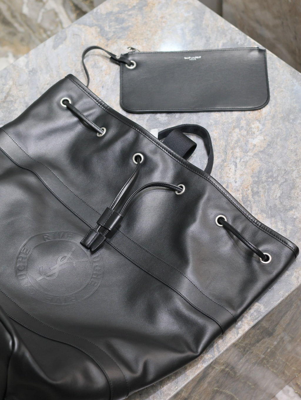 SAINT LAURENT RIVE GAUCHE BACKPACK 49 IN BLACK CALFSKIN